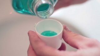 Image of Mouthwash being poured into a cup
